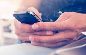 man-holding-cellphone